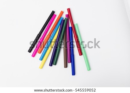 12 markers on white background