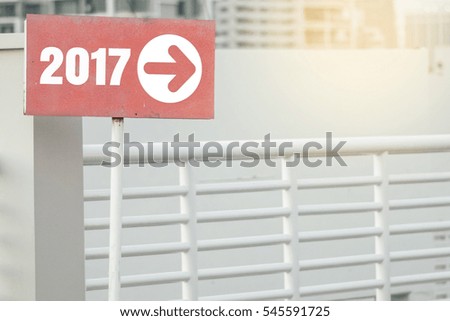 2017 ahead arrow sign car parking area with flare vintage tone