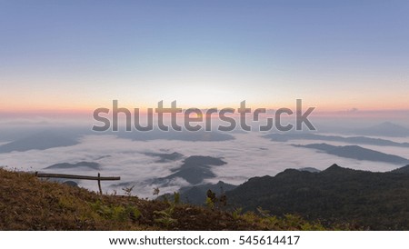 Beautiful Sunrise of travel place with morning mist at Phu chi duen Unseen in Chiangrai,Thailand