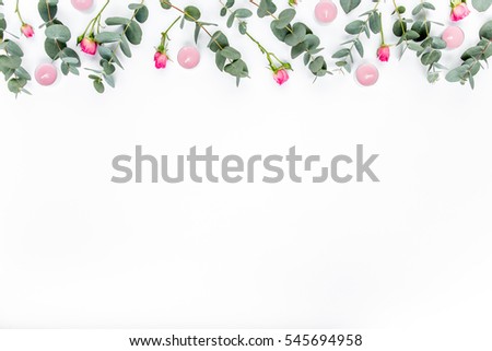roses, eucalyptus branches, candles, leaves isolated on white background. flat lay, overhead view