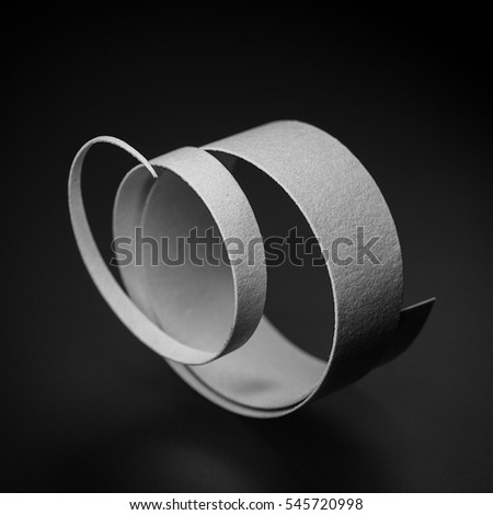 Abstract image of a paper spiral Royalty-Free Stock Photo #545720998