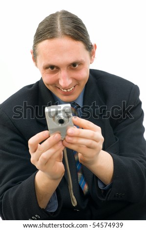 Businessman using and review picture on digital camera