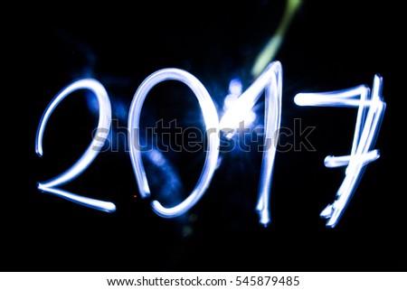 New Year 2017 with light painting on a black background
