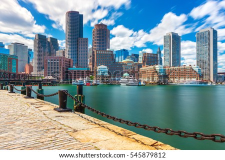 Boston cityscape in sunny day, view from harbor on downtown, Massachusetts, USA