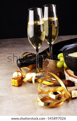 Conceptual Golden Brown Wine on Elegant Glass with Spiral Thin Wrapping Foils or Laces Decoration, on Abstract Brown Background - Champagne sylvester party