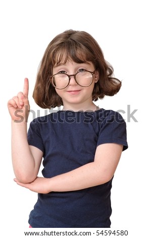 Little girl in round spectacles raising finger in attention gesture isolated