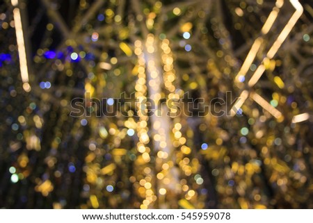 abstract light celebration background with de focused lights