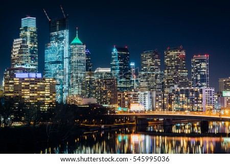 The Philadelphia skyline and Schuylkill River at night, in Philadelphia, Pennsylvania.