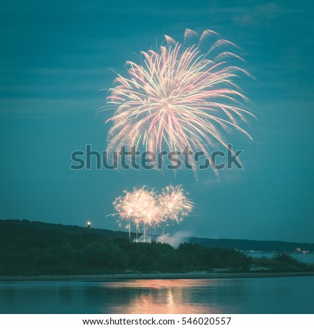 Firework festival on the Baltic seashore in the night - instant vintage square photo