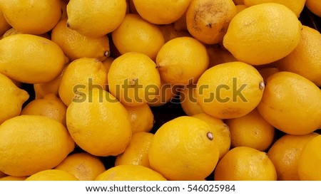 image of many fresh lemons in pile together 