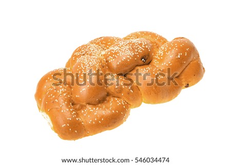 One bright shabbat challah with seeds isolated on white background