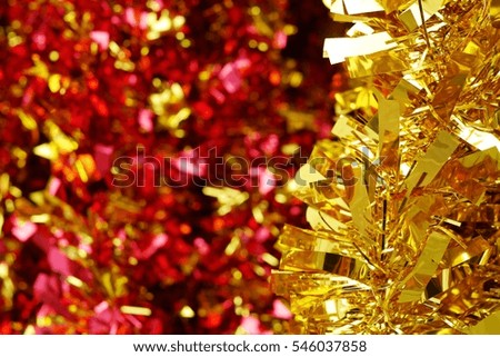 Gold and red glistering paper background 