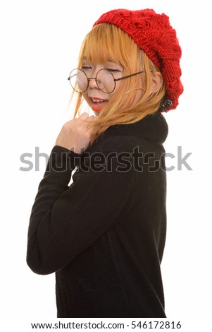 Young happy Asian woman smiling with eyes closed isolated against white background