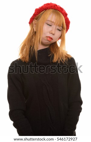 Young cute Asian woman feeling upset isolated against white background