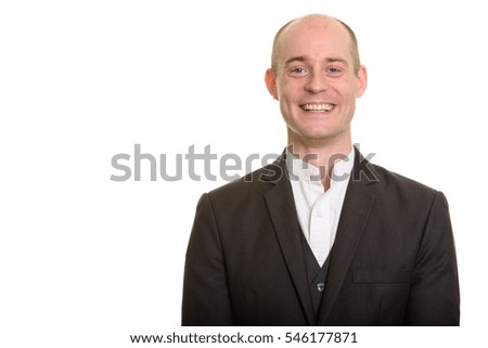 Happy bald Caucasian businessman smiling isolated against white background
