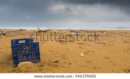 Garbage on a beach left by tourist, environmental pollution concept picture, Mediterranean Sea coast, Sicily