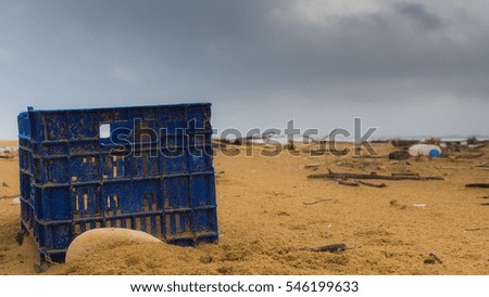 Garbage on a beach left by tourist, environmental pollution concept picture, Mediterranean Sea coast, Sicily