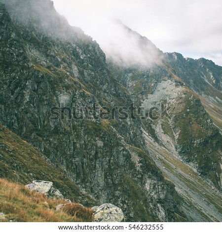 Tatra mountains in Slovakia covered with clouds. autumn colors. - instant vintage square photo