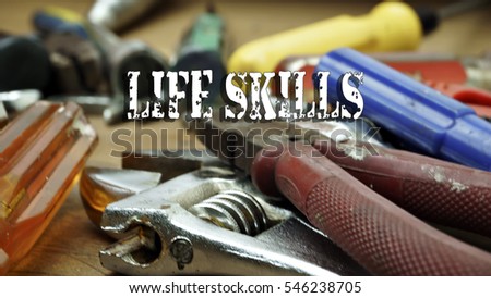 Construction equipment set with the word "LIFE SKILLS"