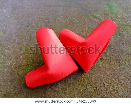 Red paper hearts Isolated on Gray Black stone background. You can use as Greeting Card for Valentines Day "Happy Birth Valentines Day'"