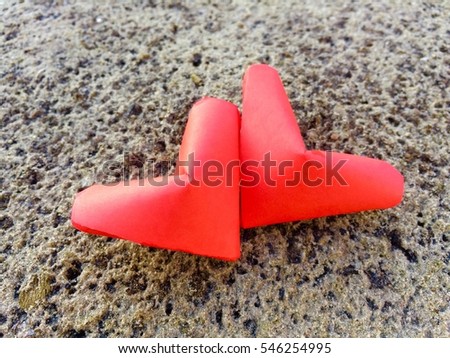 Red paper hearts Isolated on Dark Sand background. You can use as Greeting Card for Valentines Day "Happy Birth Valentines Day'"