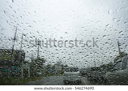 Rain on car miror 