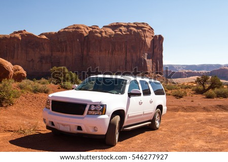 the SUV offroad vehicle at the Monument valley Royalty-Free Stock Photo #546277927