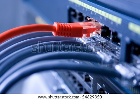 Information Technology Computer Network, Telecommunication Ethernet Cables Connected to Internet Switch, Data Center Concept Royalty-Free Stock Photo #54629350