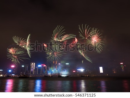Fireworks in Hong Kong New Year celebration 2017 at Victoria Harbour from Tsim Sha Tsui promenade