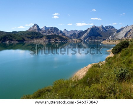 Picos de Europa, Spain: artificial lake in the natural park Picos de Europa Royalty-Free Stock Photo #546373849