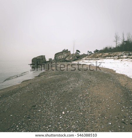 Baltic Sea and foggy morning on the shore - instant vintage square photo