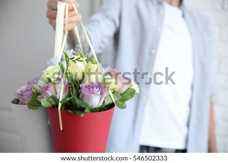 Man holding beautiful bouquets, closeup