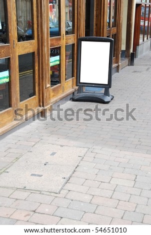 empty outdoor restaurant/pub menu in a british downtown street