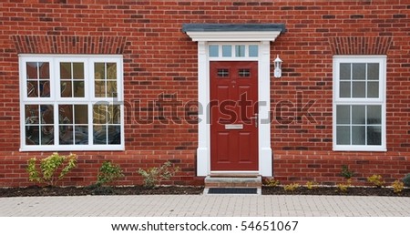close-up of a typical british residential house with small entrance garden Royalty-Free Stock Photo #54651067