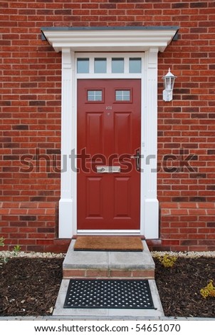 entrance of a typical british residential house with small entrance garden Royalty-Free Stock Photo #54651070