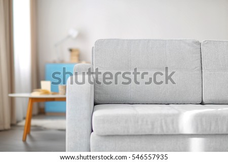 New cozy couch in modern room interior Royalty-Free Stock Photo #546557935