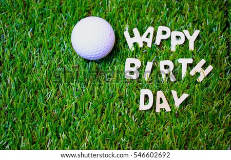 Happy birthday to golfer with golf ball on green grass.