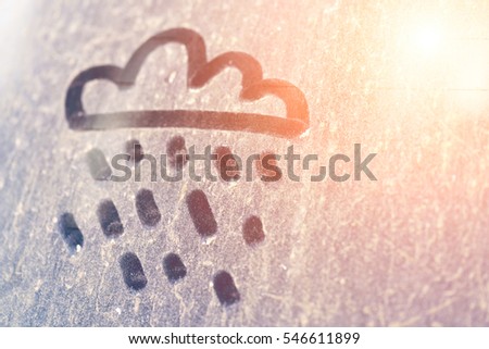 Rain icon on a dirty glass with glow