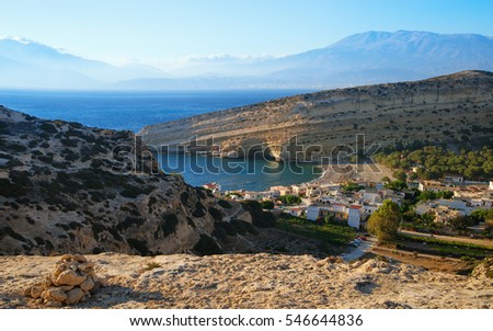 Top view of the village of Matala and caves where the hippies lived. Tourist destination on the island of Crete. Greece.