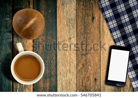 Hot coffee on table wood background