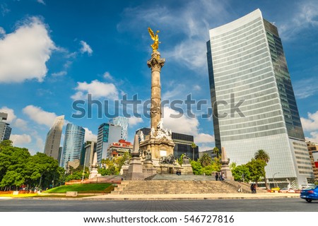 The Angel of Independence stands in the center of a roundabout in Mexico City, Mexico. Royalty-Free Stock Photo #546727816
