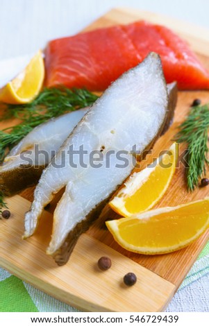 Fish, salmon, halibut and lemon closeup