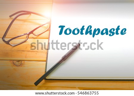 Toothpaste  - Abstract hand writing word to represent the meaning of word as concept. The word Toothpaste is a part of Action Vocabulary Words in stock photo.