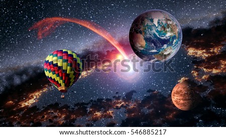 Hot air balloon outer space shooting star planet fairy tale stunning surreal fantasy landscape. Elements of this image furnished by NASA.