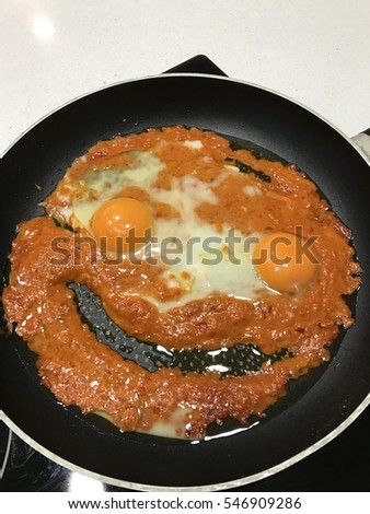 Smiling Happy Face Frying Eggs