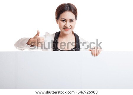 Young Asian woman show thumbs up with blank sign  isolated on white background.