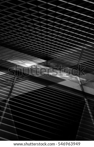 Reworked photo of lath / louvered structural ceiling and wall. Fragment of industrial, public or office interior with striped and checkered patterns. Abstract modern architecture. Hi-tech building.