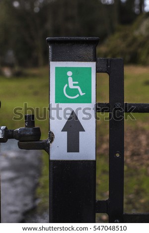 Wheelchair Accessibility Sign on Gate