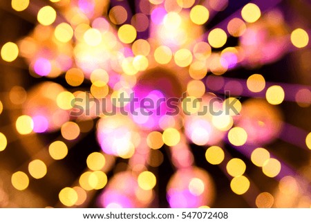 Blurred view of light canopy with light bokeh