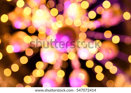 Blurred view of light canopy with light bokeh